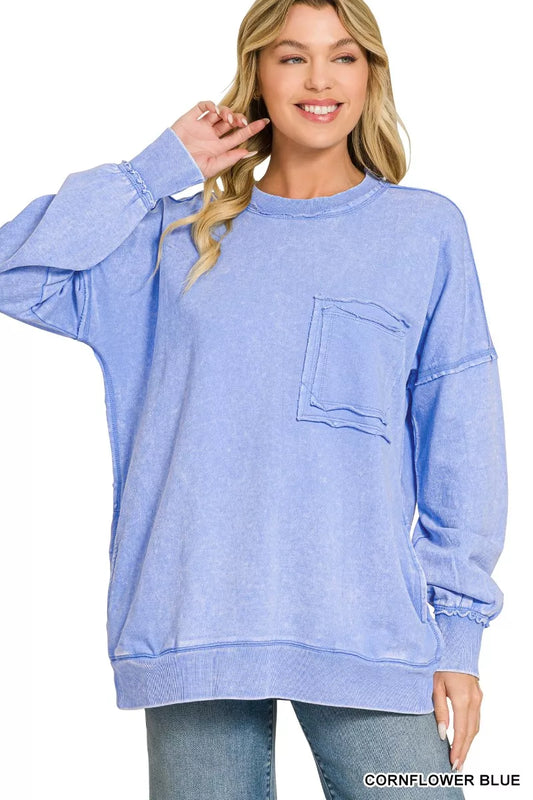 Vintage acid wash French terry pullover sweatshirt featuring a relaxed fit, raw hem detailing, front patch pocket, and soft 100% cotton fabric for casual everyday comfort.