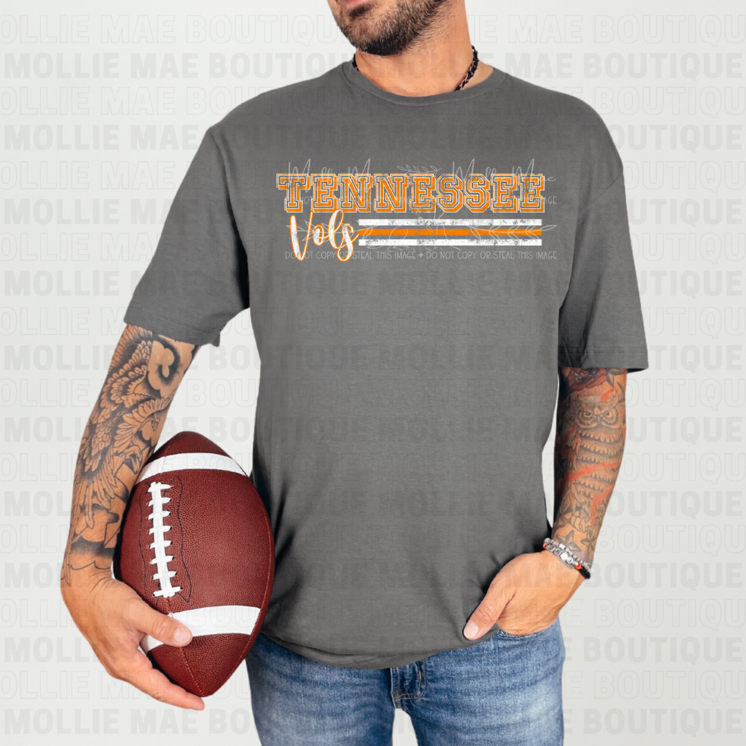 Man modeling Tennessee Vols Stripe Graphic Tee in charcoal with orange stripe graphic.