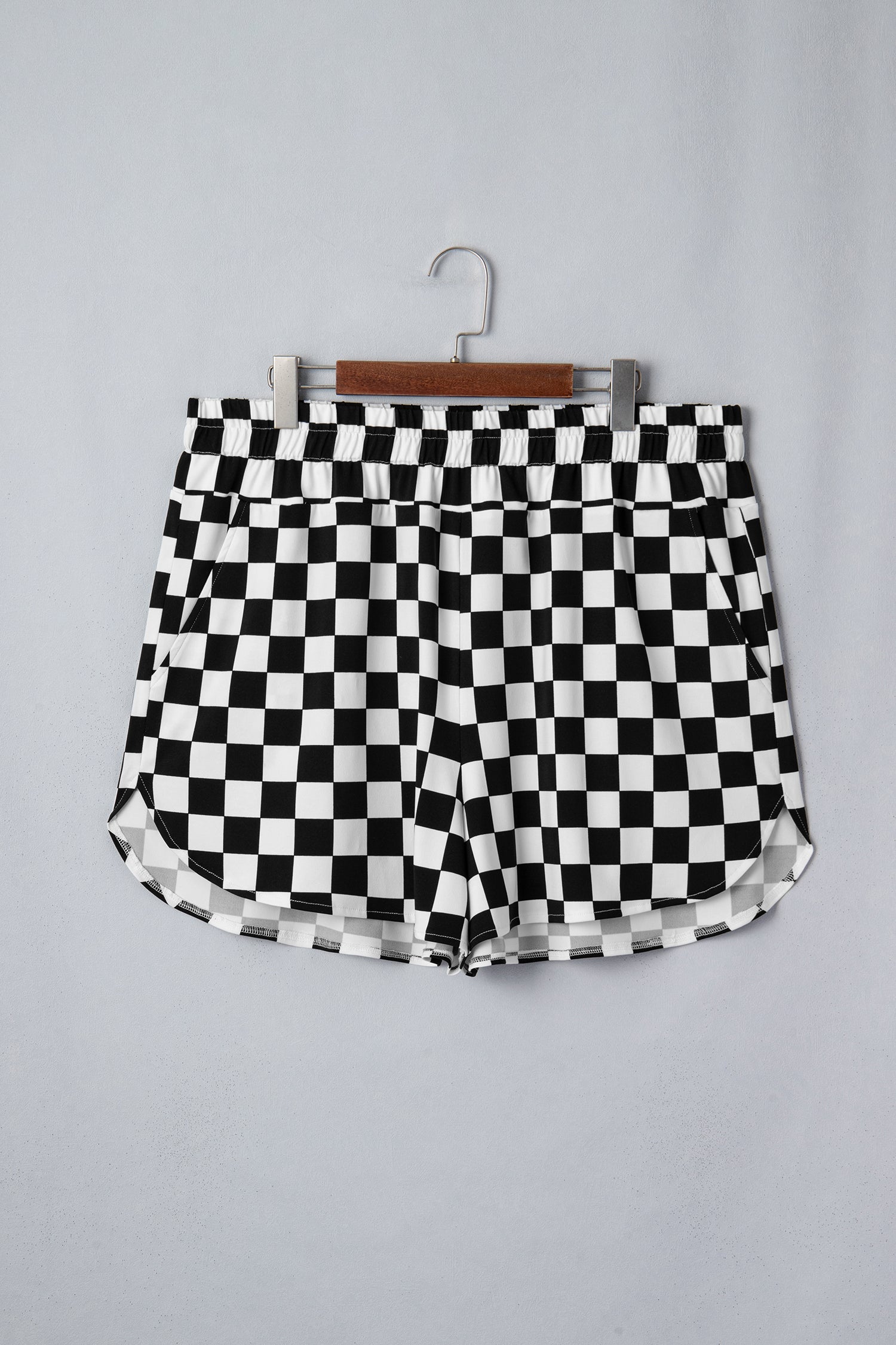 plus size black checker athleisure shorts with pockets for women
