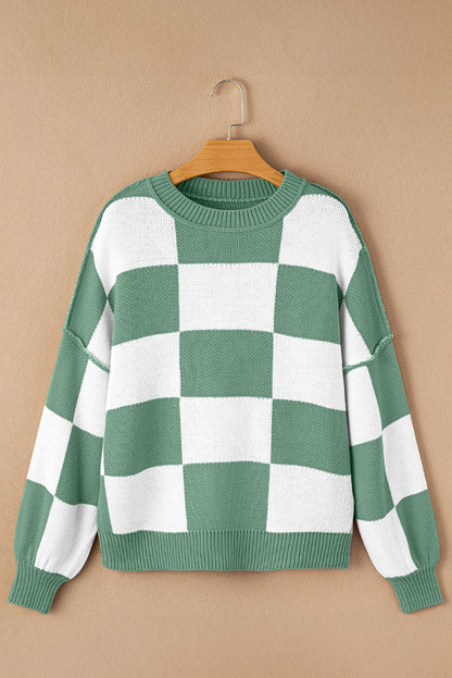 Green checkered exposed seam drop shoulder sweater with checkered knit, exposed seam details and relaxed drop shoulders, women’s boutique fashion