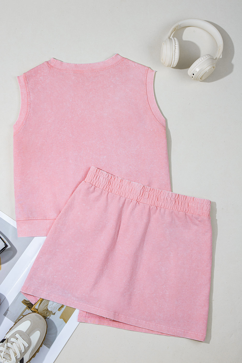 Light Pink Mineral wash tank top and lined skort set with soft washed color, comfortable fit, and sporty boutique summer style