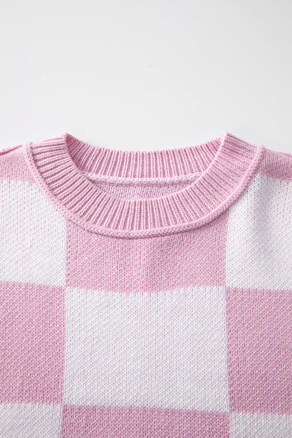 Grapefruit Orange checkered exposed seam drop shoulder sweater with checkered knit, exposed seam details and relaxed drop shoulders, women’s boutique fashion