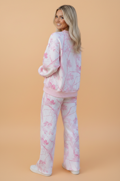 Pink Camo V-Neck Top and Pants Set with a flattering V-neck top and comfortable drawstring pants, boutique fashion