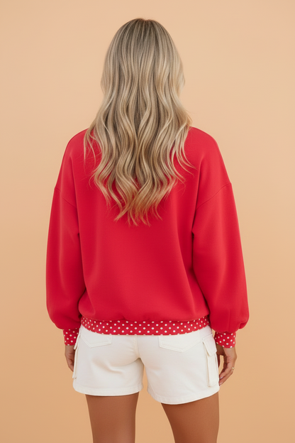 Polka dot colorblock long sleeve sweatshirt with contrast trim and relaxed tunic fit