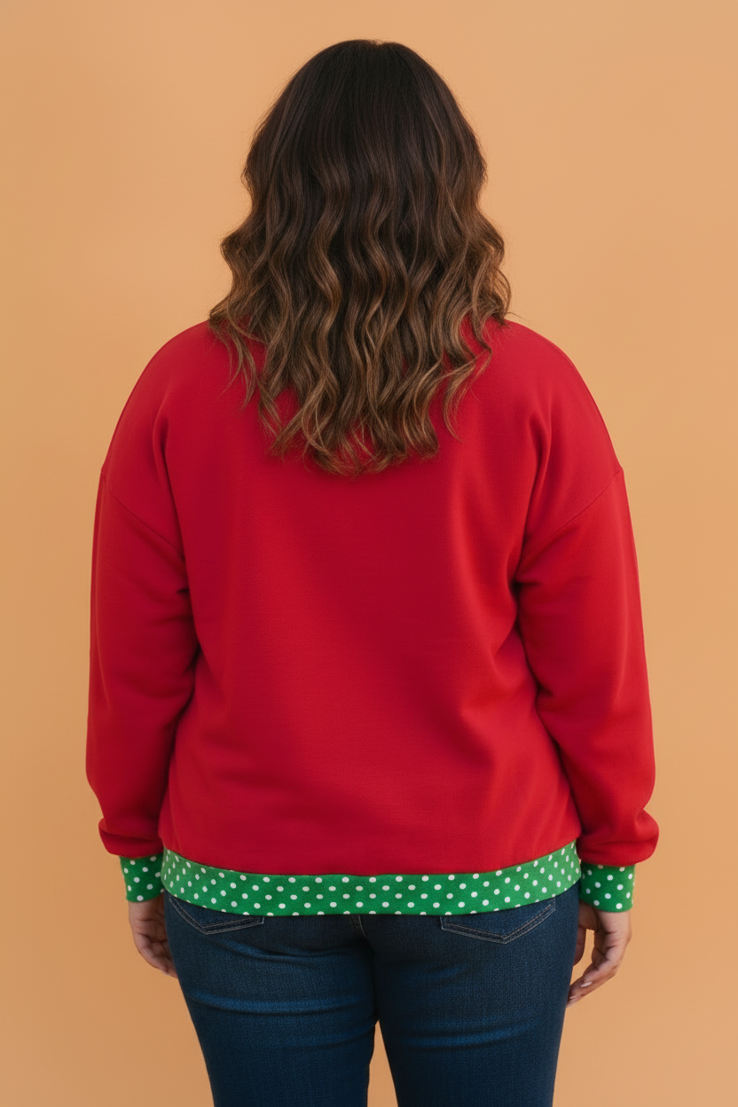 Orange plus size polka dot contrast trim mock neck sweatshirt with polka dot print, contrast trim, mock neckline and relaxed fit, women’s boutique fashion