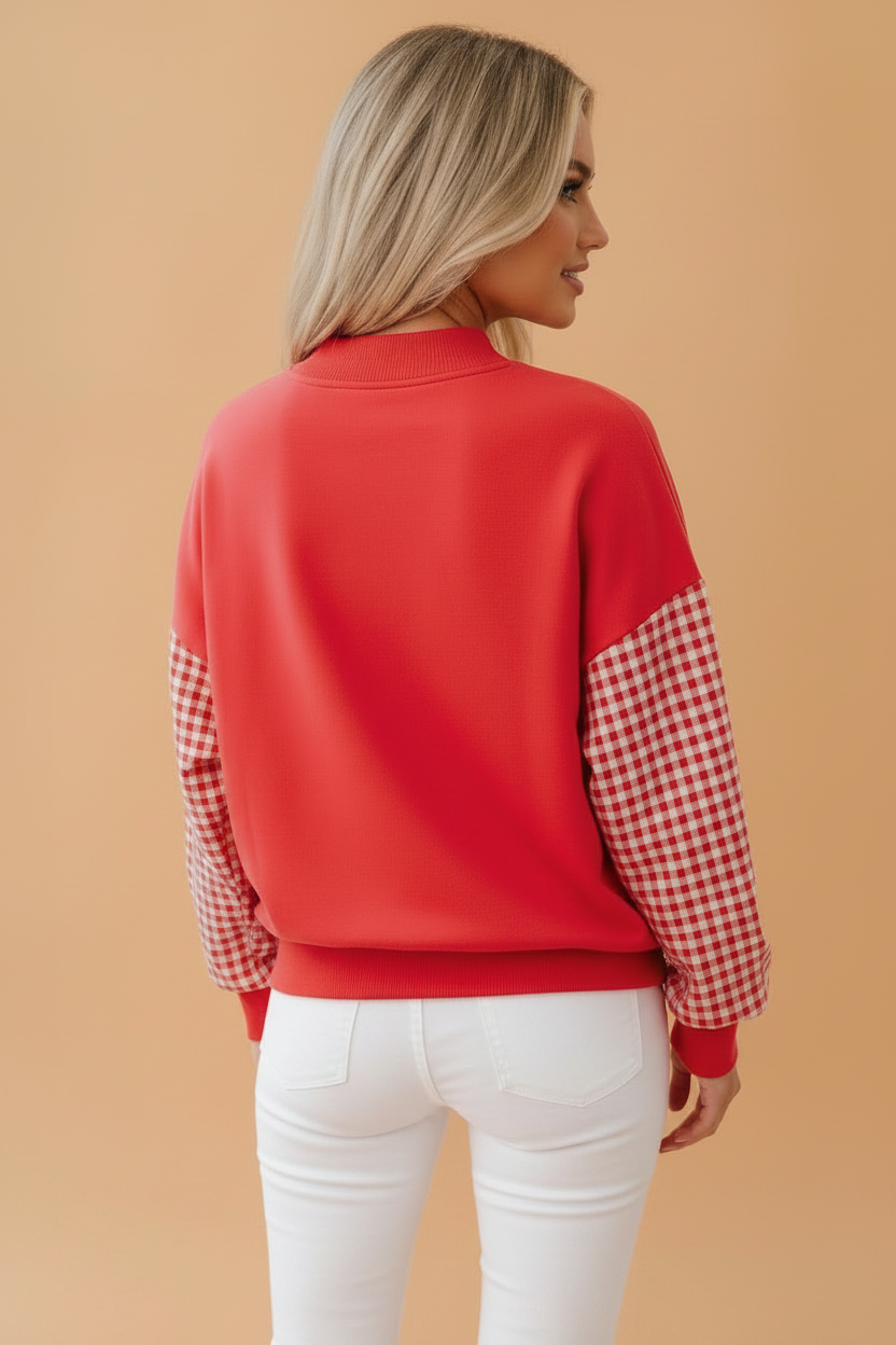 Fiery red Merry oversized Christmas sweatshirt with gingham sleeves and boutique style