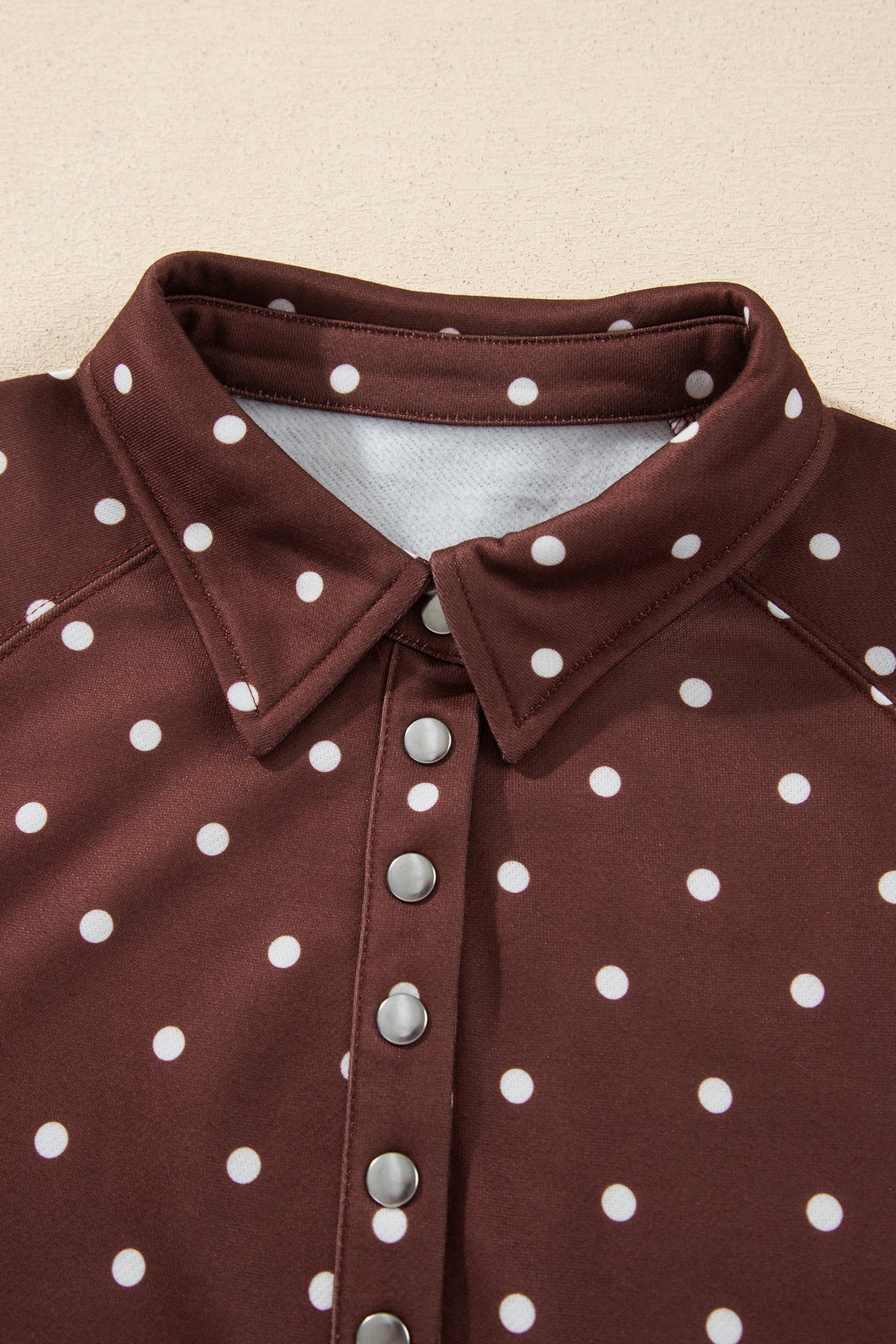 Pink polka dot button collar pullover sweatshirt with polka dot print, metal button collar and ribbed trim, women’s boutique fashion