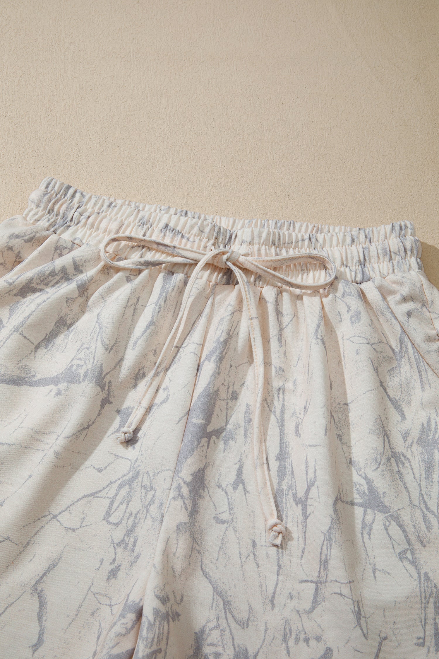 Camo V-Neck Loose Tee & Drawstring Shorts Set Pretty Bash women's boutique top from Mollie Mae Boutique