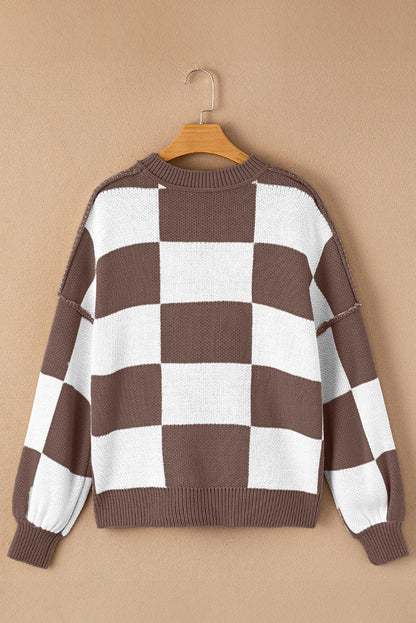 Green checkered exposed seam drop shoulder sweater with checkered knit, exposed seam details and relaxed drop shoulders, women’s boutique fashion