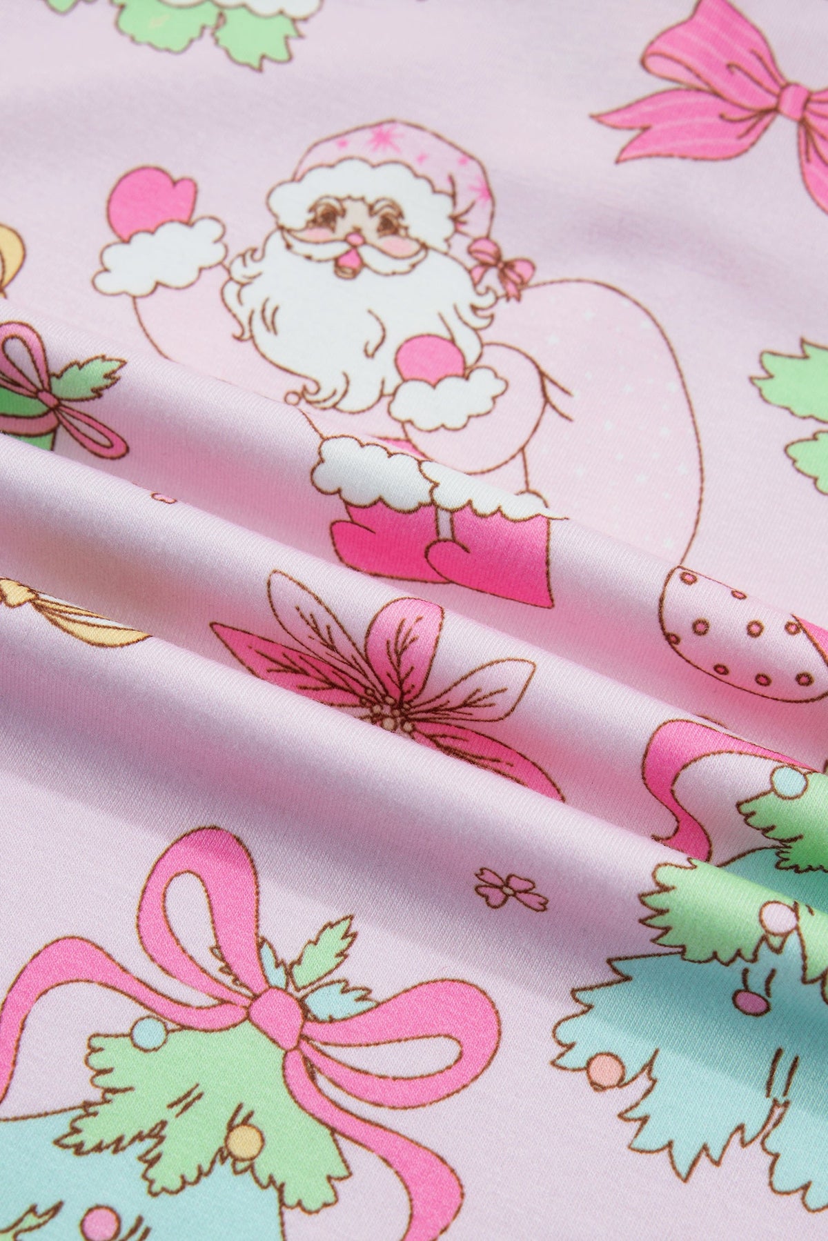 pink Christmas pajama set with ruffle collar, long sleeves and festive print boutique loungewear