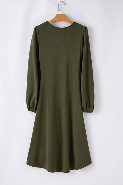 Jungle green ruched puff sleeve midi dress with flattering waist and boutique style
