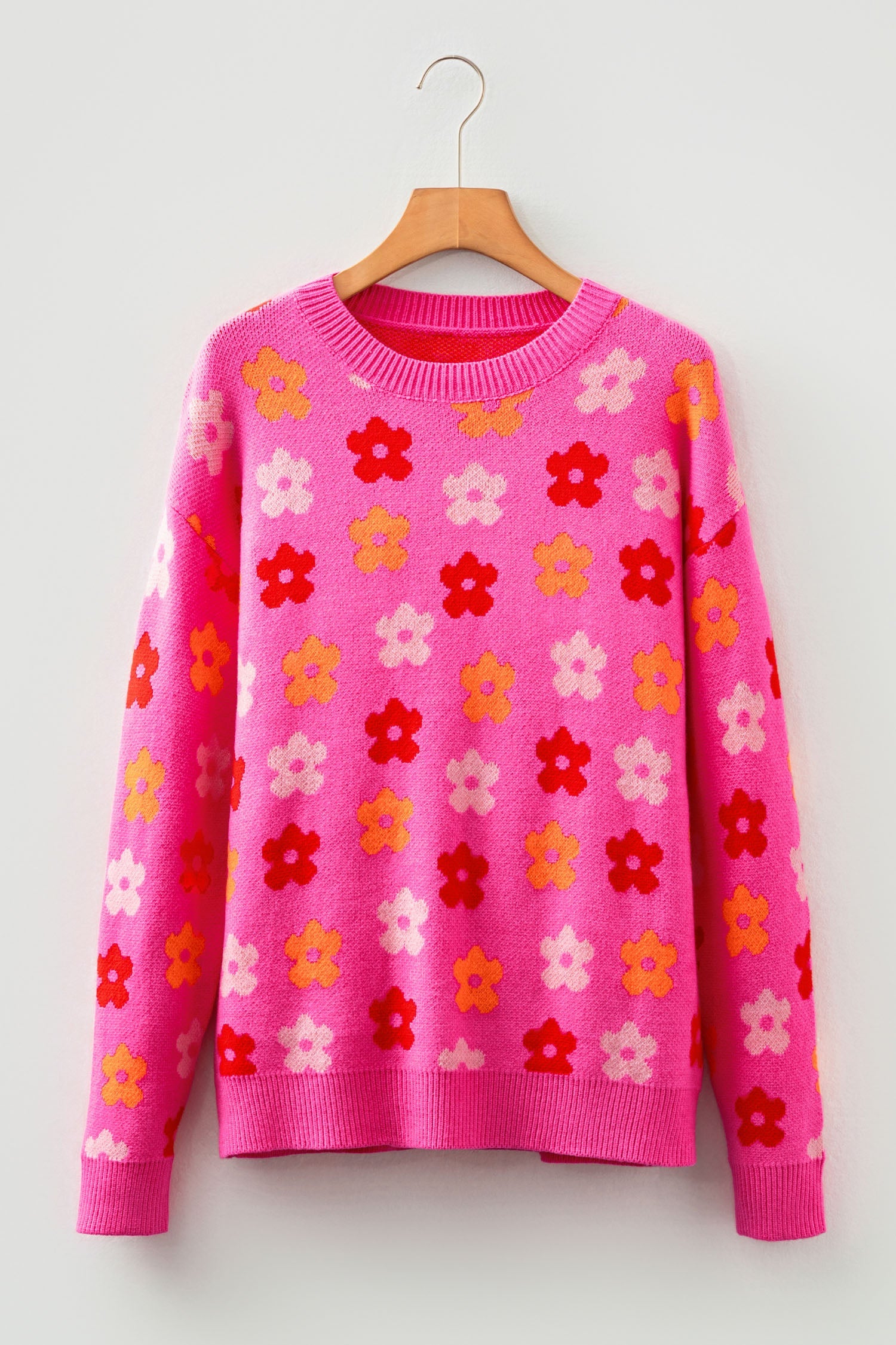 Rose floral drop shoulder ribbed trim sweater with allover floral pattern, drop shoulders and ribbed trim, women’s boutique fashion