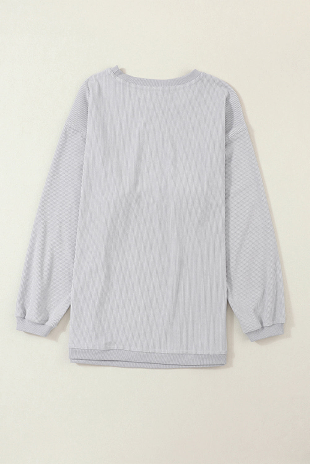 White ribbed corduroy oversized long sleeve sweatshirt with cozy boutique styling