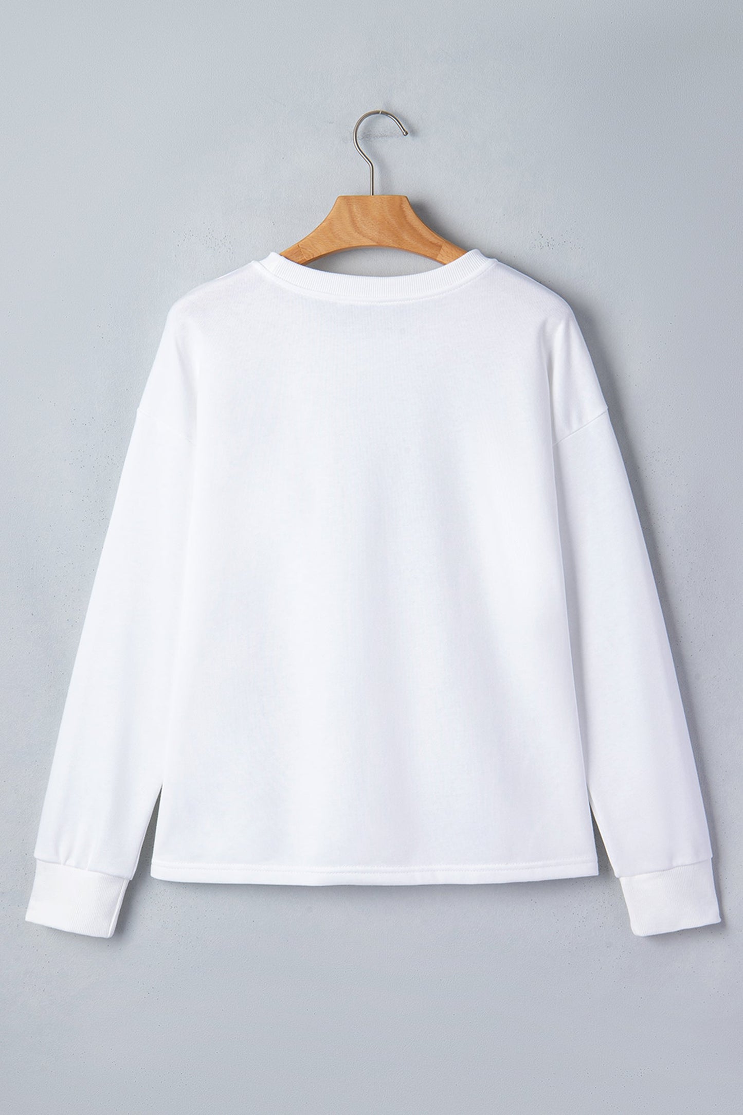 White Solid Drop Shoulder Long Sleeve Top featuring boutique-style details and relaxed everyday fit