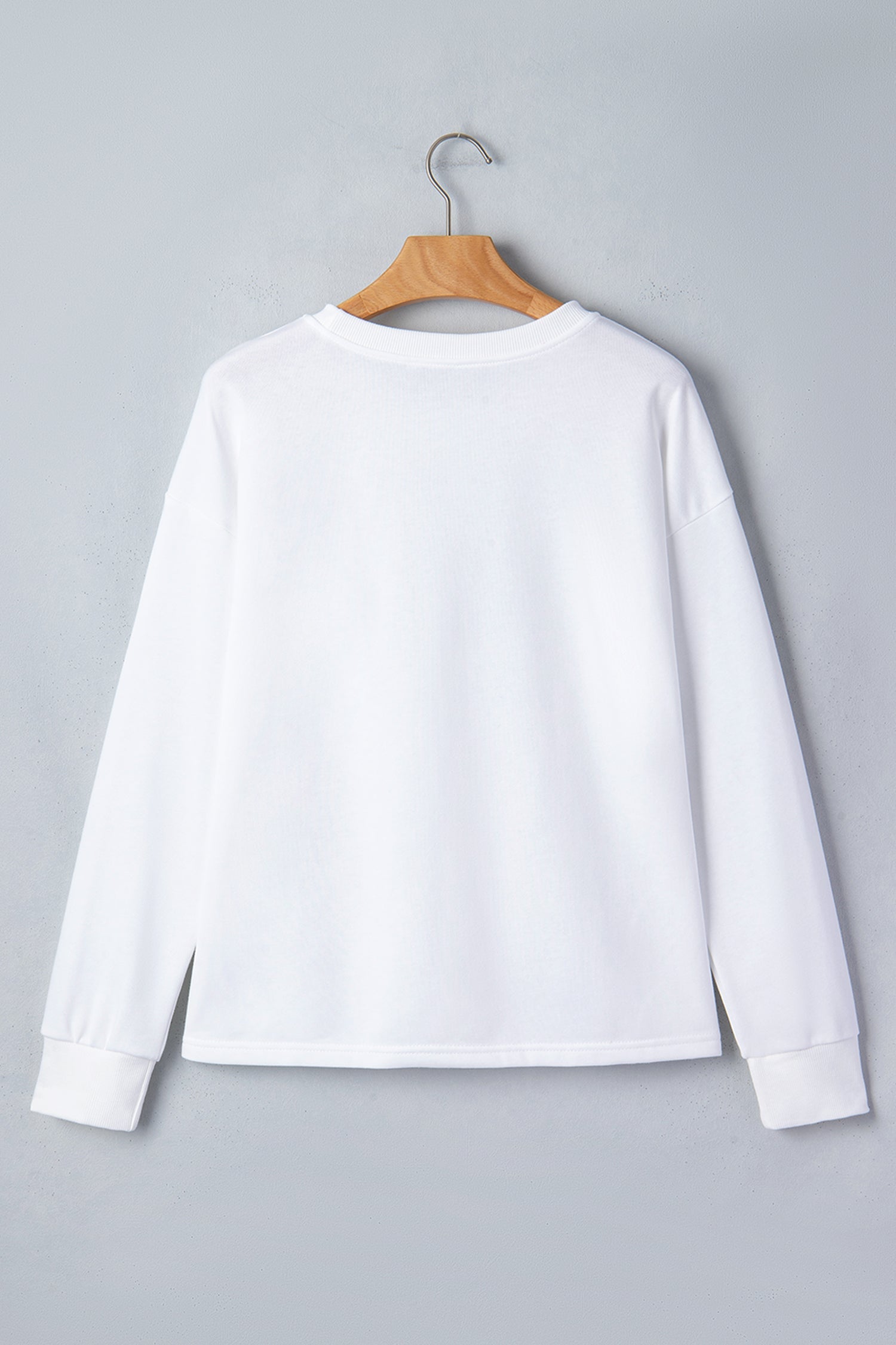 White Solid Drop Shoulder Long Sleeve Top featuring boutique-style details and relaxed everyday fit