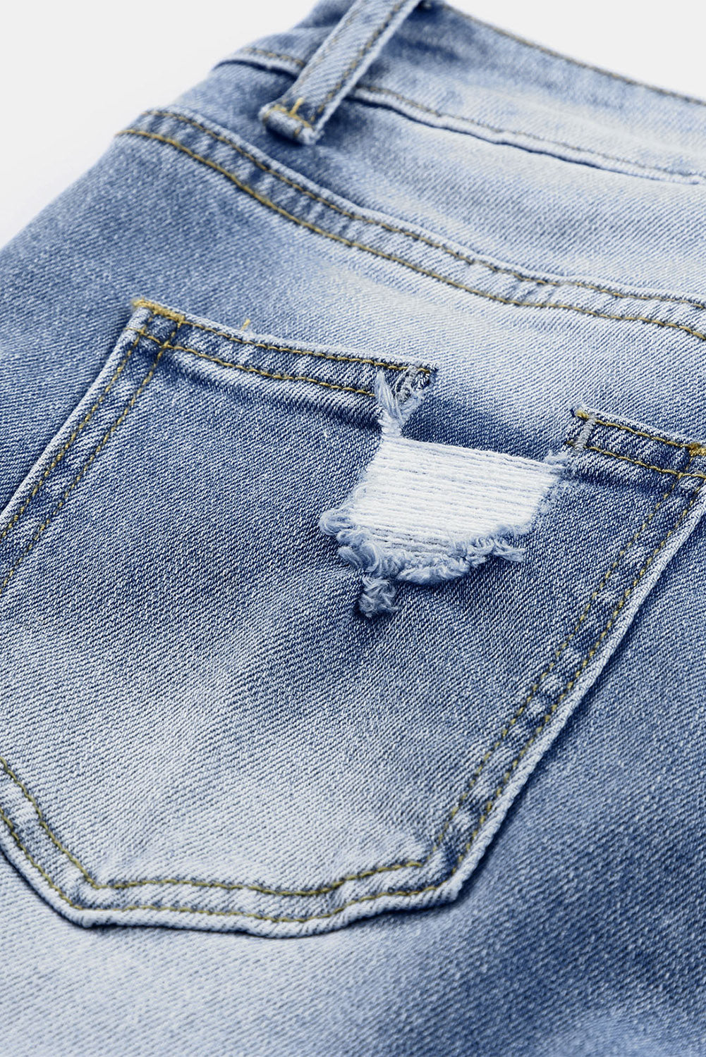 Georgia distressed skinny capri jeans in sky blue washed denim for women