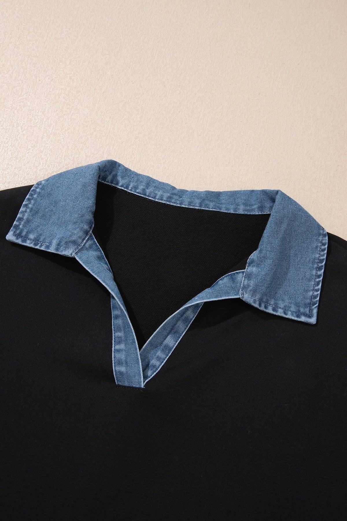plus size black V-neck knit blouse with contrast denim collar boutique top