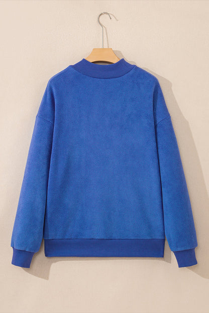 Bluing reversible mock neck drop shoulder oversized sweatshirt with relaxed boutique styling