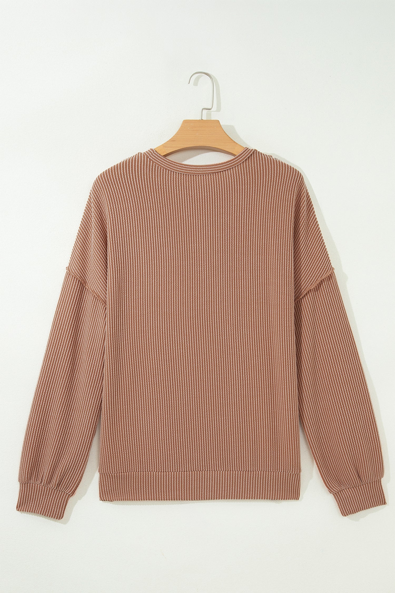 Dune leopard colorblock corded knit long sleeve top with reverse seams and relaxed fit